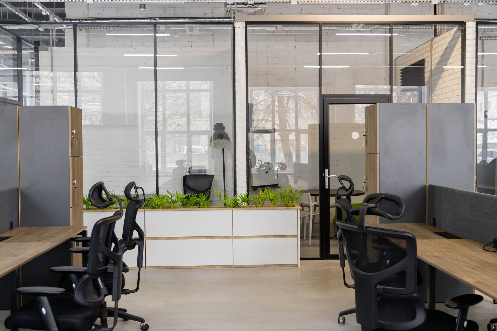 interior-of-modern-coworking-space-without-people-containing-tables-and-chairs-1.jpg